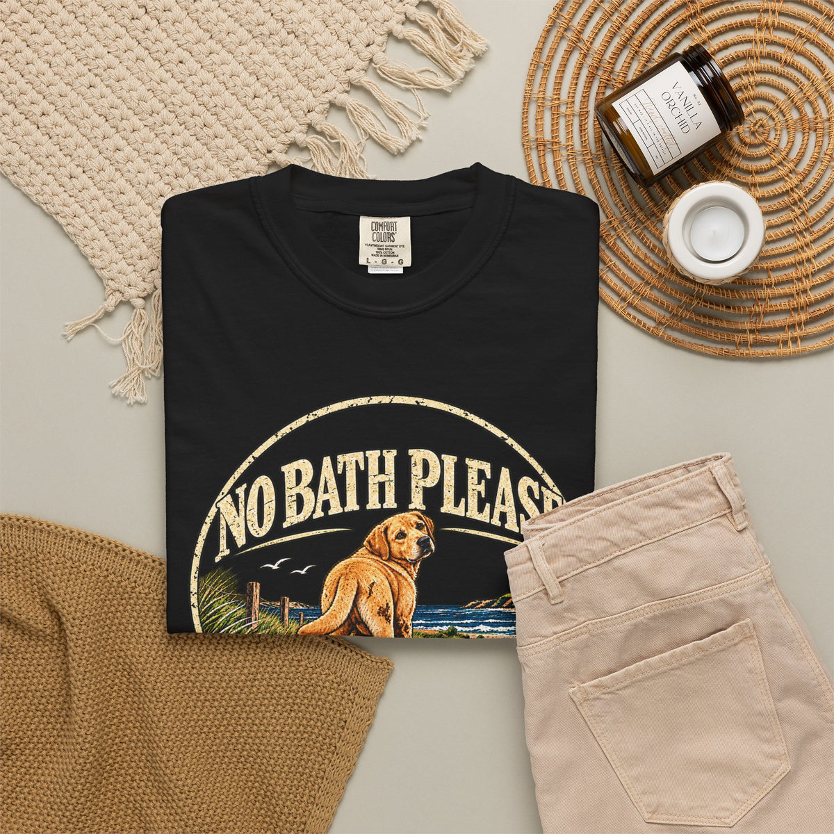 Flat-lay Brinehound T-shirt mockup showing dog in a No Bath Please coastal badge.
