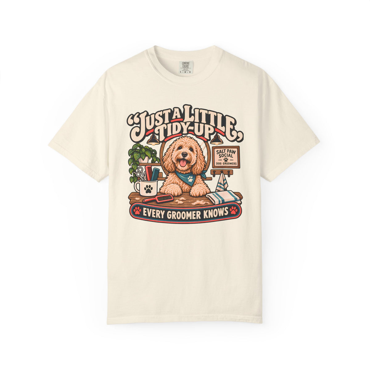 Brinehound T-shirt showing Just a Little Tidy-Up lettering with a shaggy dog and grooming tools.