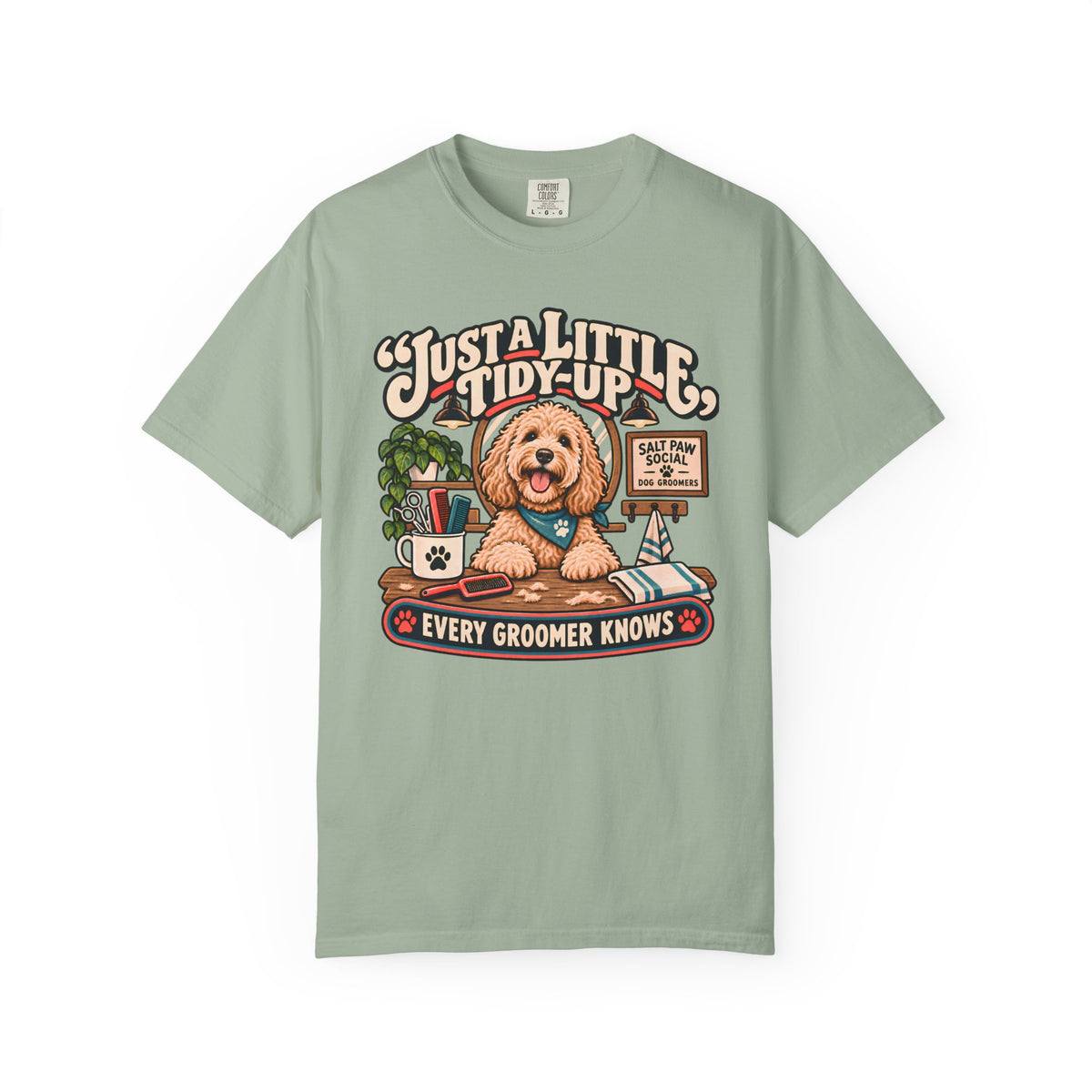 Brinehound T-shirt showing Just a Little Tidy-Up lettering with a shaggy dog and grooming tools.