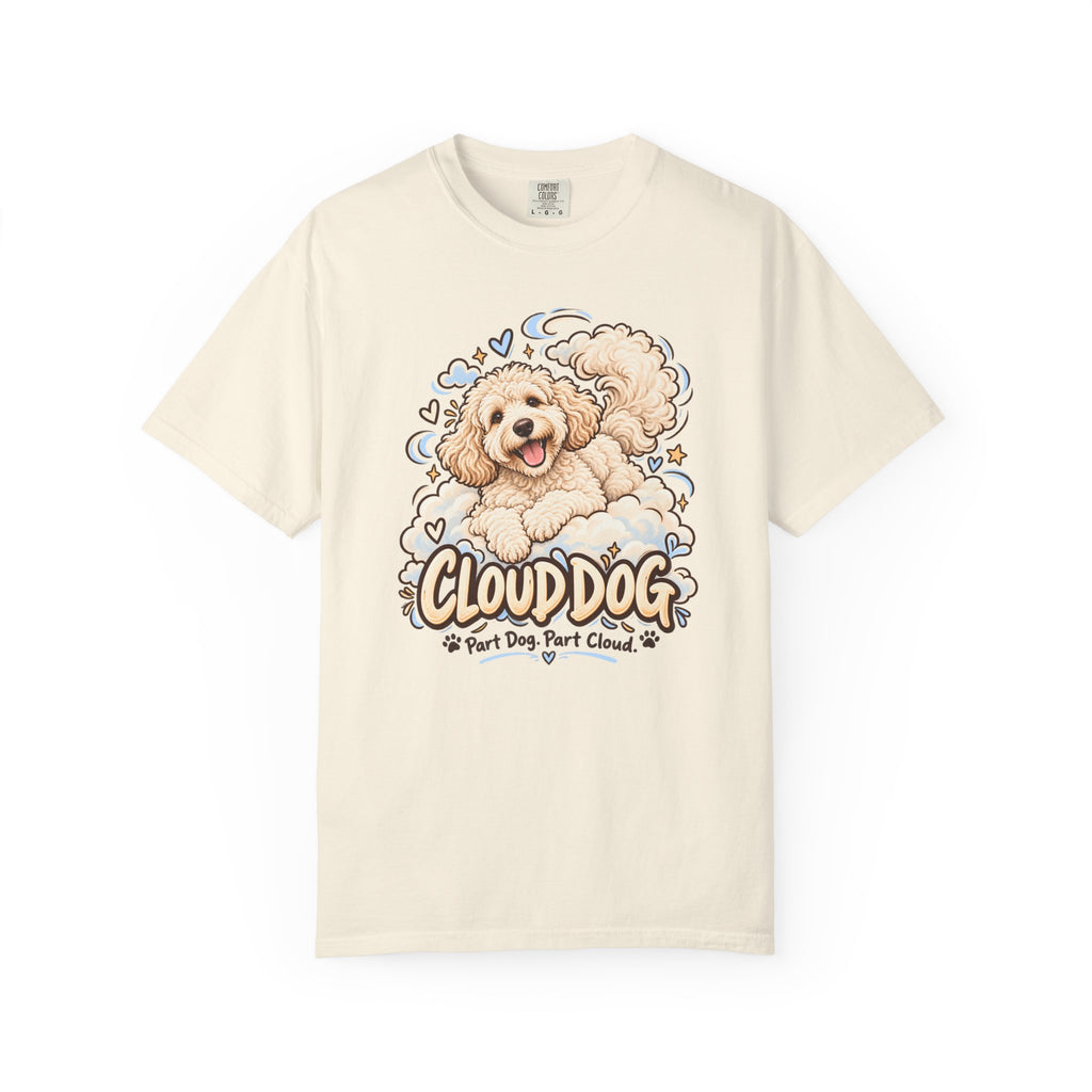 Ivory Cloud Dog T-shirt, featuring a fluffy white dog surrounded by blue cloud outlines and stars and the wording “Cloud Dog — Part Dog. Part Cloud.”
