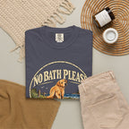 Flat-lay Brinehound T-shirt mockup showing dog in a No Bath Please coastal badge.