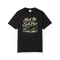 Brinehound T-shirt showing Meet Me at Salt Paw lettering and a beach-bar scene.