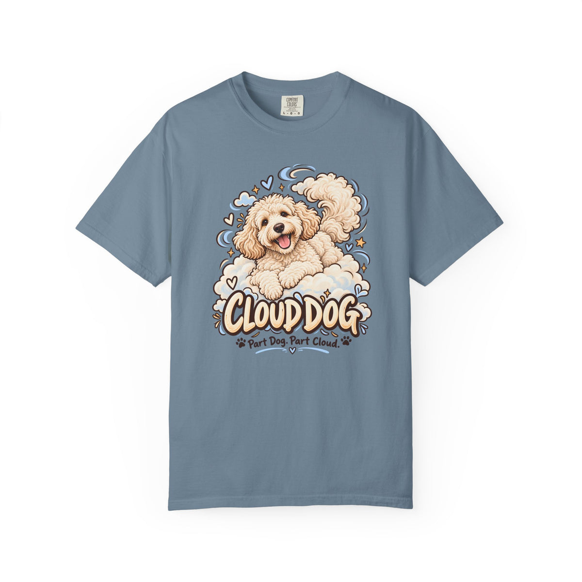 Blue Cloud Dog T-shirt, featuring a fluffy white dog surrounded by blue cloud outlines and stars and the wording “Cloud Dog — Part Dog. Part Cloud.”