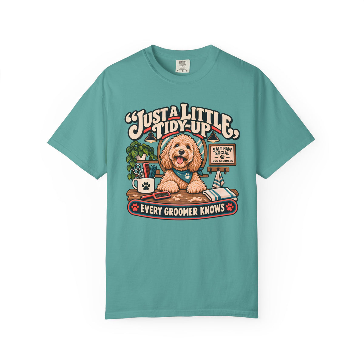 Brinehound T-shirt showing Just a Little Tidy-Up lettering with a shaggy dog and grooming tools.