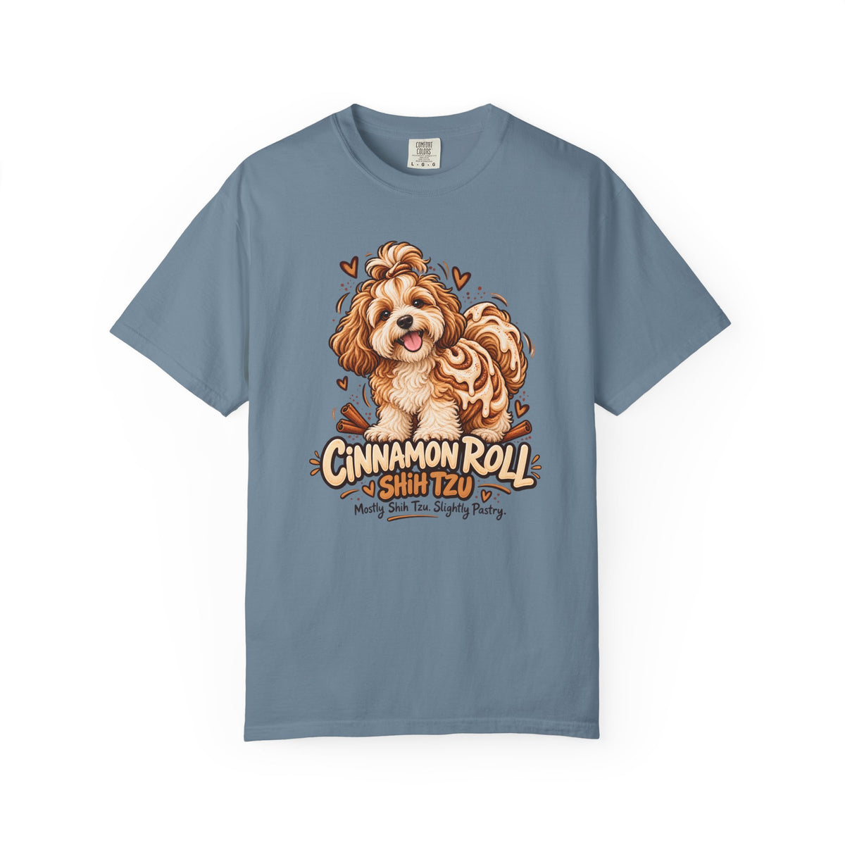 Blue Cinnamon Roll Shih Tzu T-shirt, featuring a shaggy Shih Tzu combined with a cinnamon pastry swirl and the wording “Cinnamon Roll Shih Tzu — Mostly Shih Tzu. Slightly Pastry.”