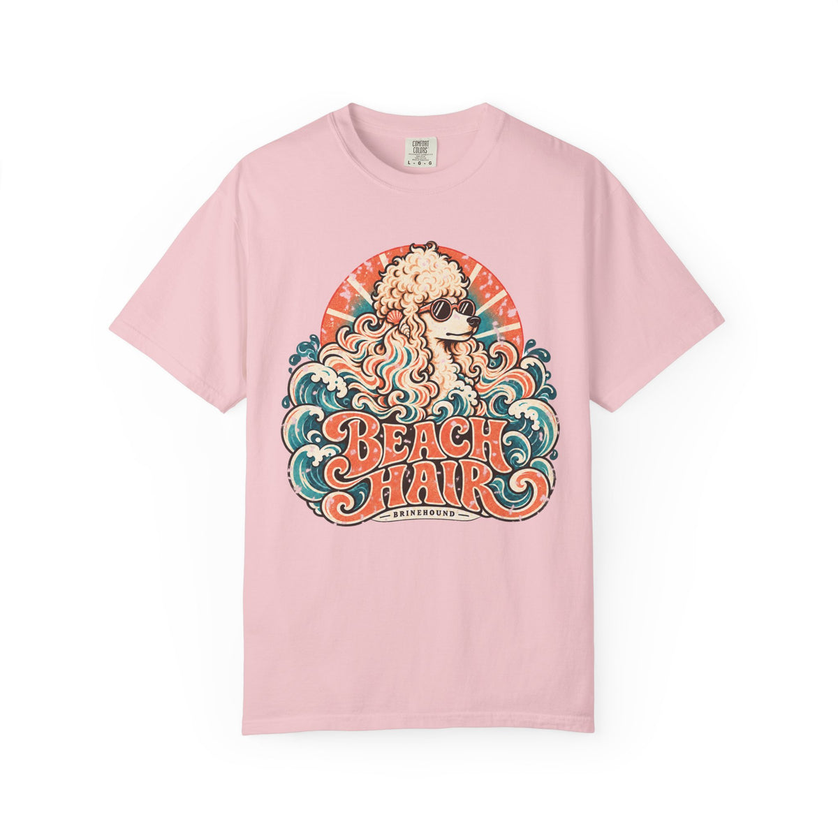 Front of a Blossom T-shirt featuring cream poodle in sunglasses, waves and “Beach Hair” lettering.