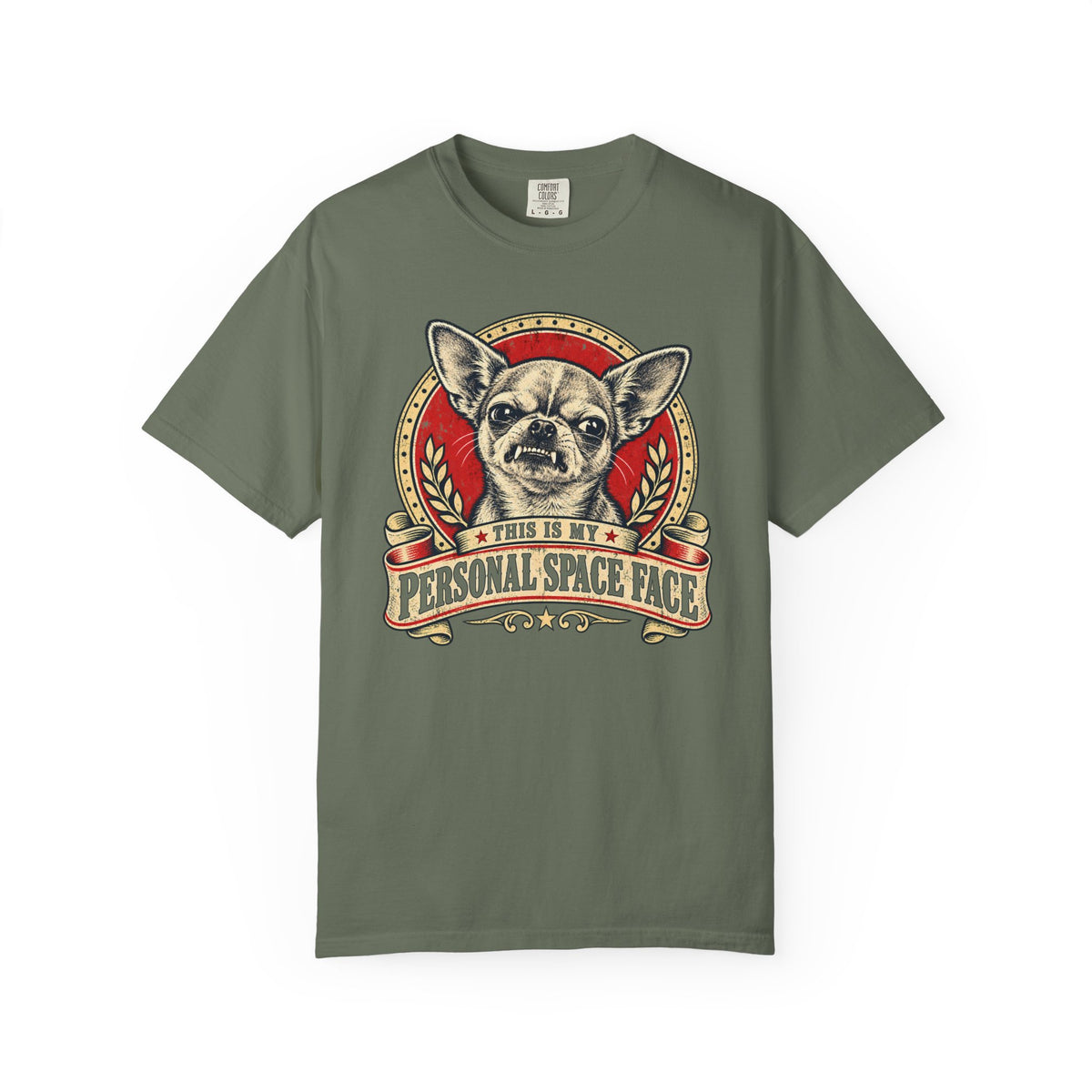 Front of a Moss T-shirt with a vintage red-and-cream Chihuahua “This is my personal space face” badge.