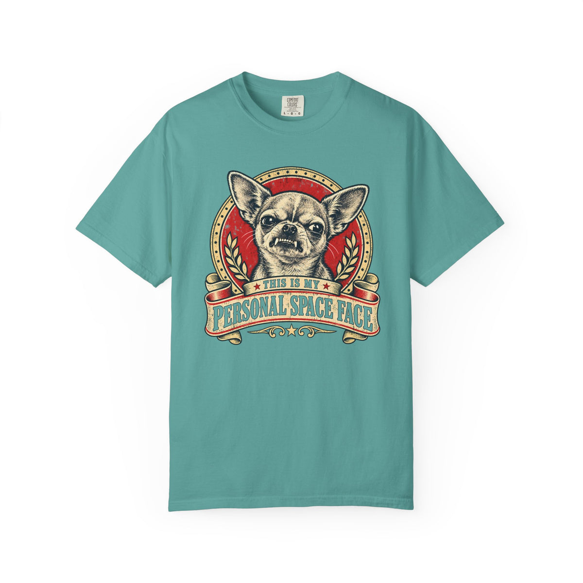 Front of a Seafoam T-shirt with a vintage red-and-cream Chihuahua “This is my personal space face” badge.