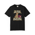 Front of a Black T-shirt with a vintage scruffy terrier beside a chewed sofa and “I’d stay and chat” lettering print.