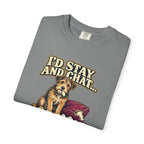 Folded Grey T-shirt showing a close-up of the scruffy terrier beside a chewed sofa and “I’d stay and chat” lettering print.