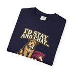 Folded True Navy T-shirt showing a close-up of the scruffy terrier beside a chewed sofa and “I’d stay and chat” lettering print.